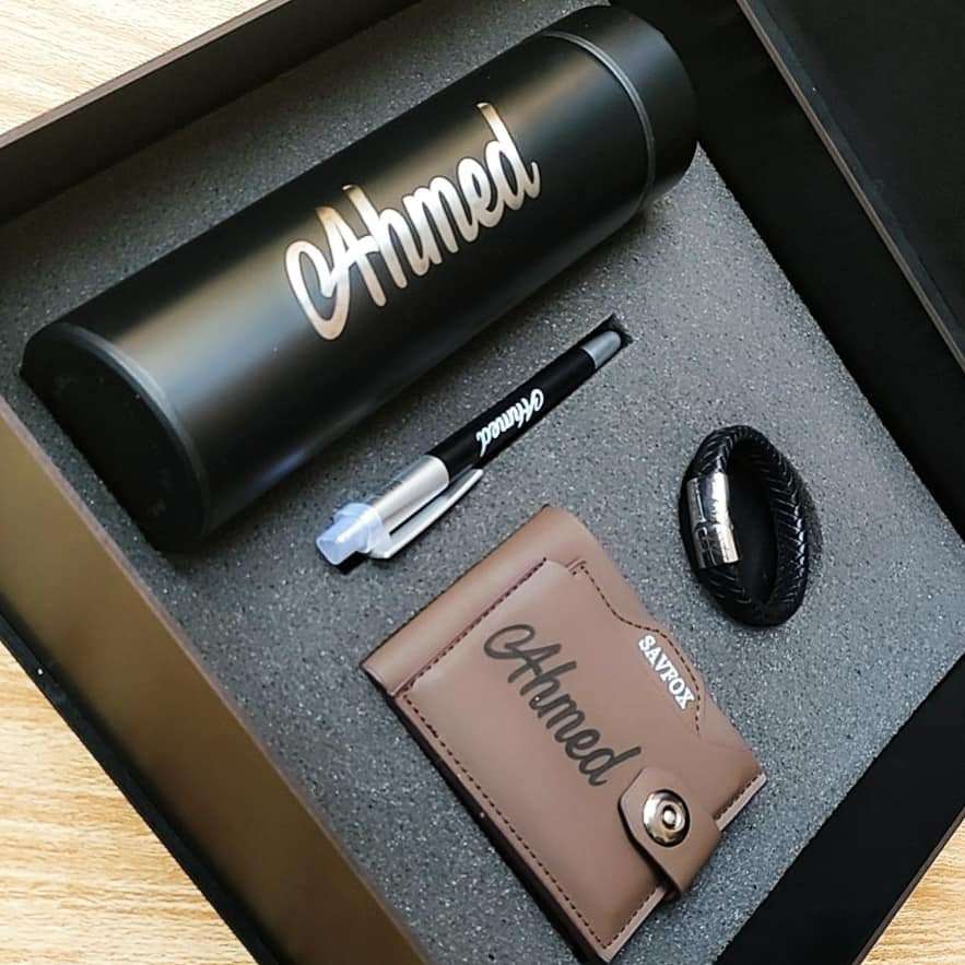 البوكس الهداية عبارة عن (محفظة+ حظاظة + قلم + مج حراري)