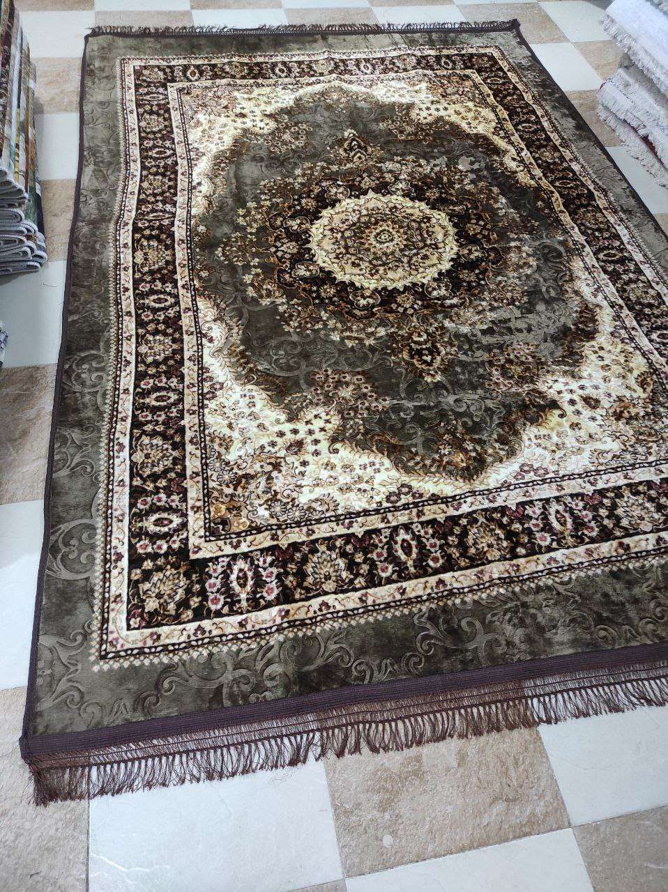 حافظة السجاد القطيفة