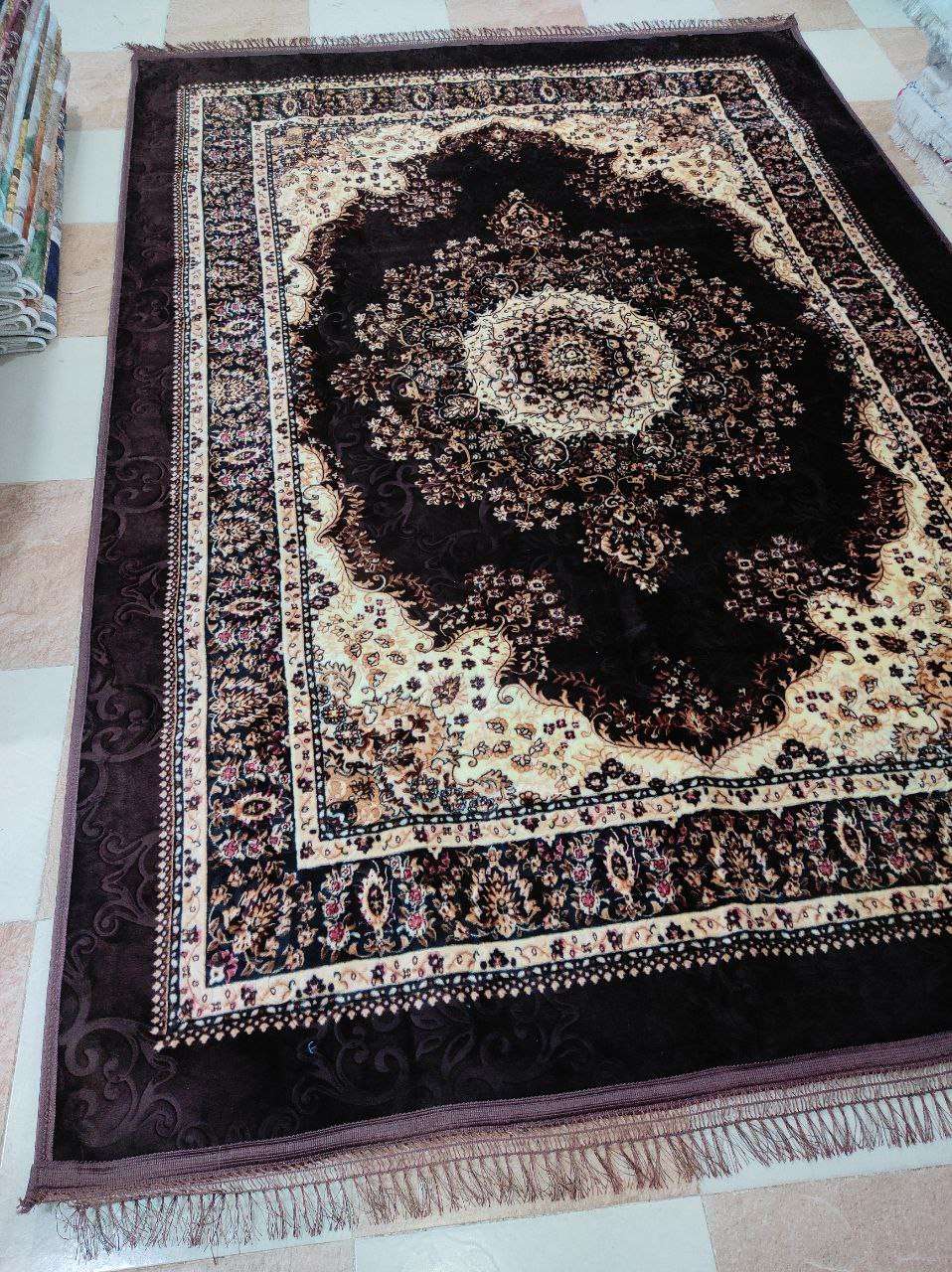 حافظة السجاد القطيفة