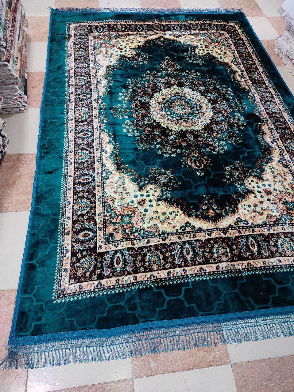 حافظة السجاد القطيفة