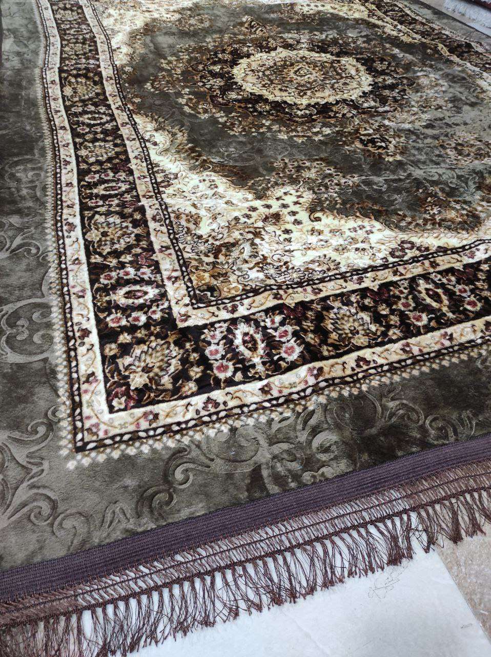 حافظة السجاد القطيفة