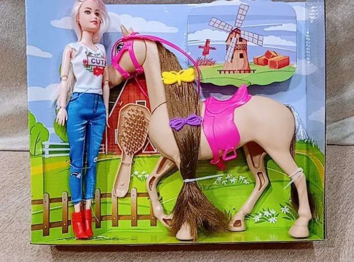 عروسة باربي بحصان
